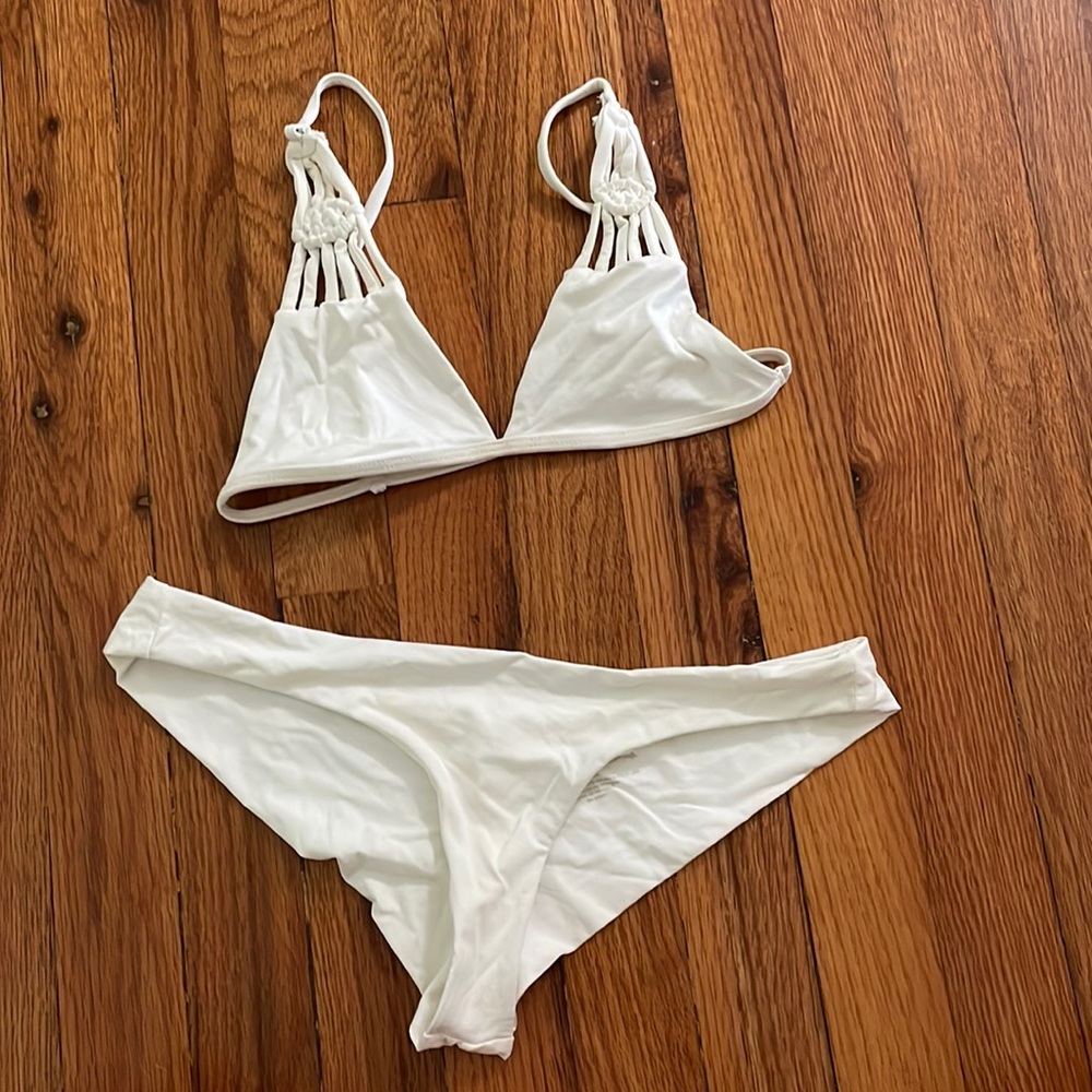 White Frankie’s bikini size small. Worn only a few times many years ago.